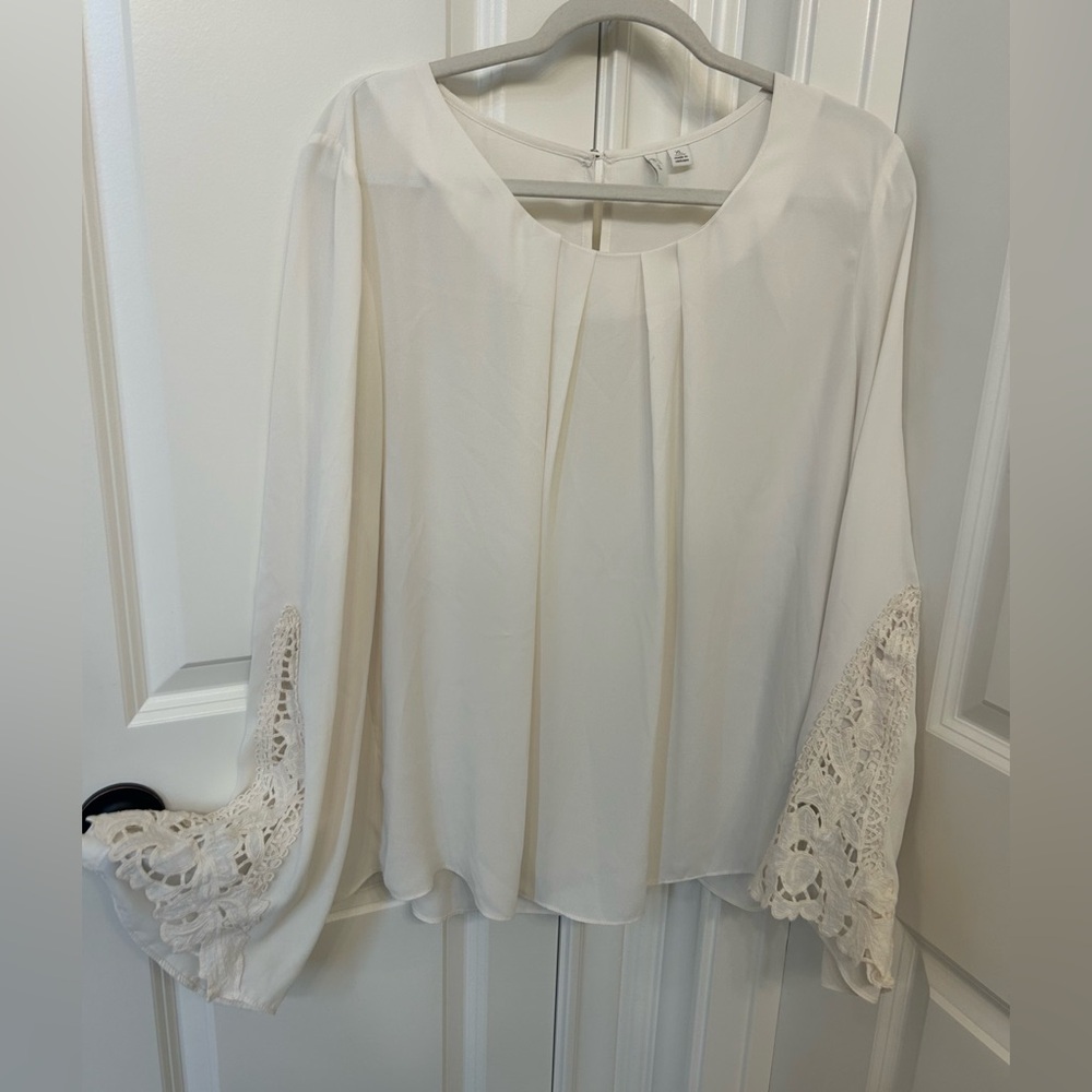 Flowy and feminine white blouse